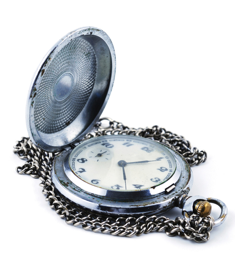 Stock photo of a silver pocket watch.