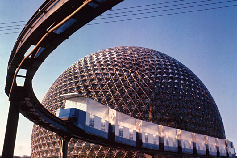 Photo of Expo 67 minirail gliding by the American pavilion.