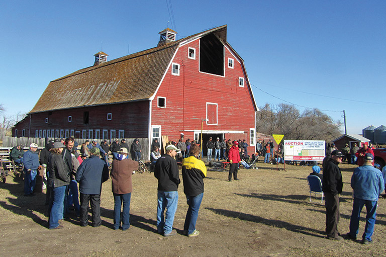 Potential buyers gather at the Brehon family farm on auction day in October 2011